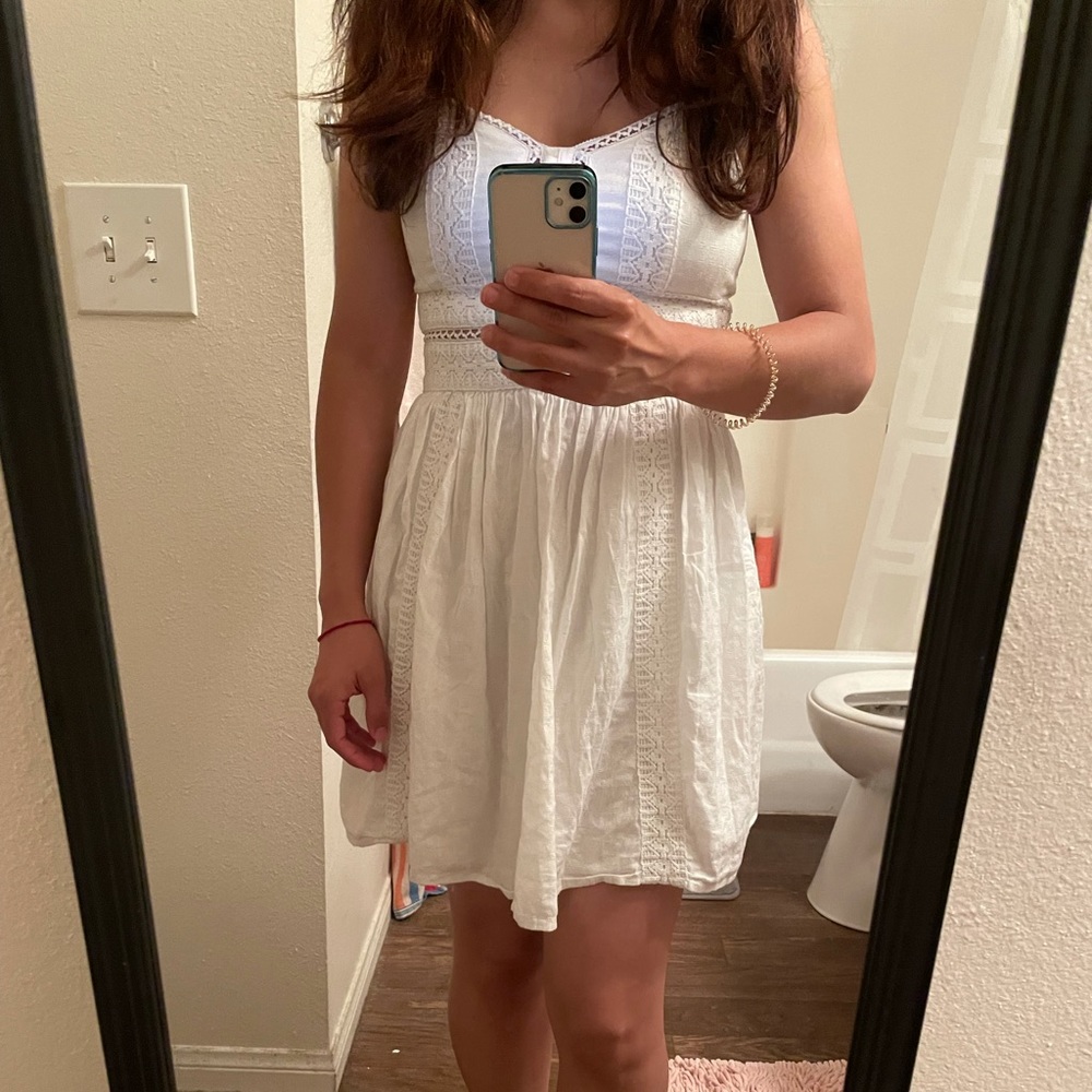 White dress with crochet details